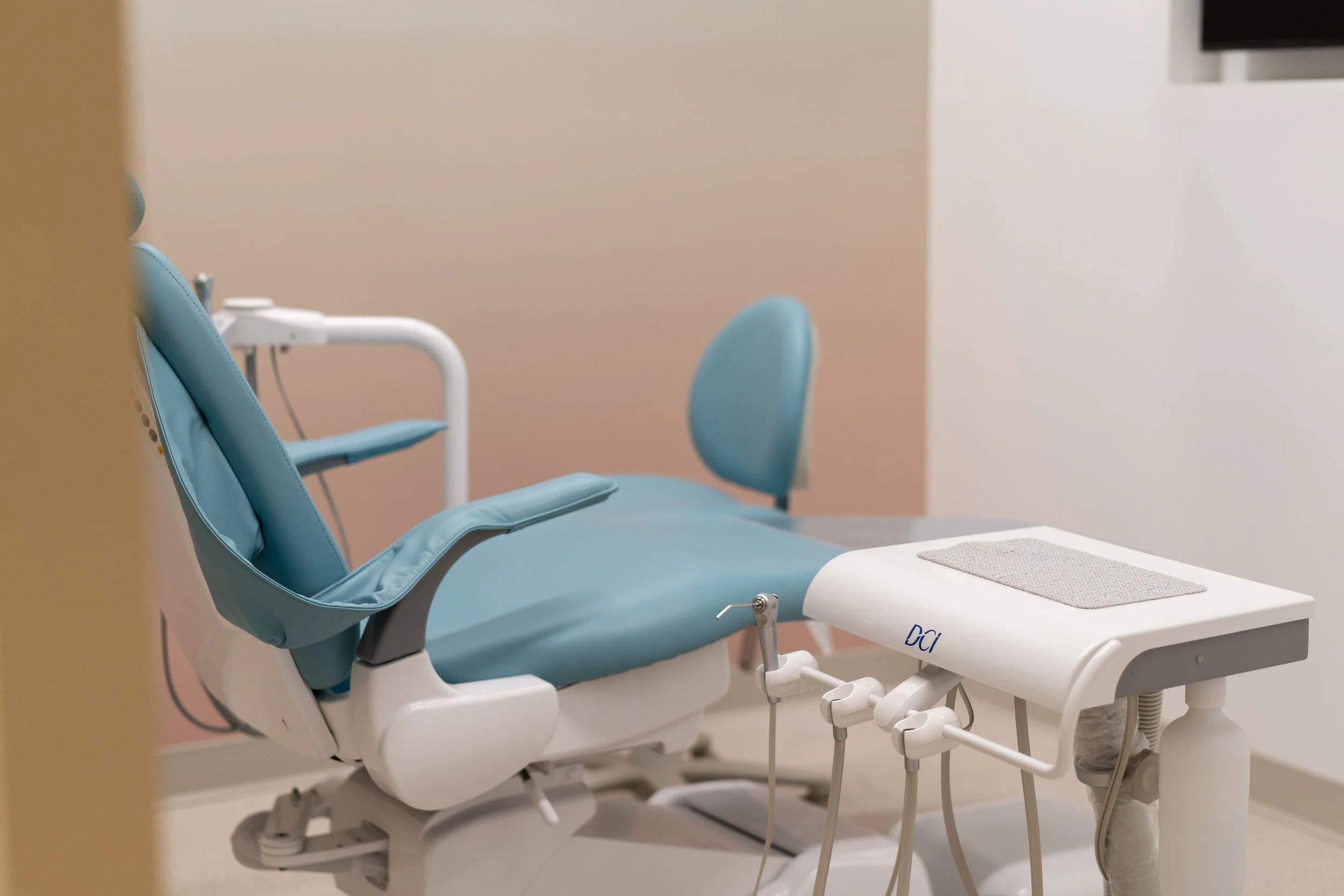 Dental office with two chairs and monitors