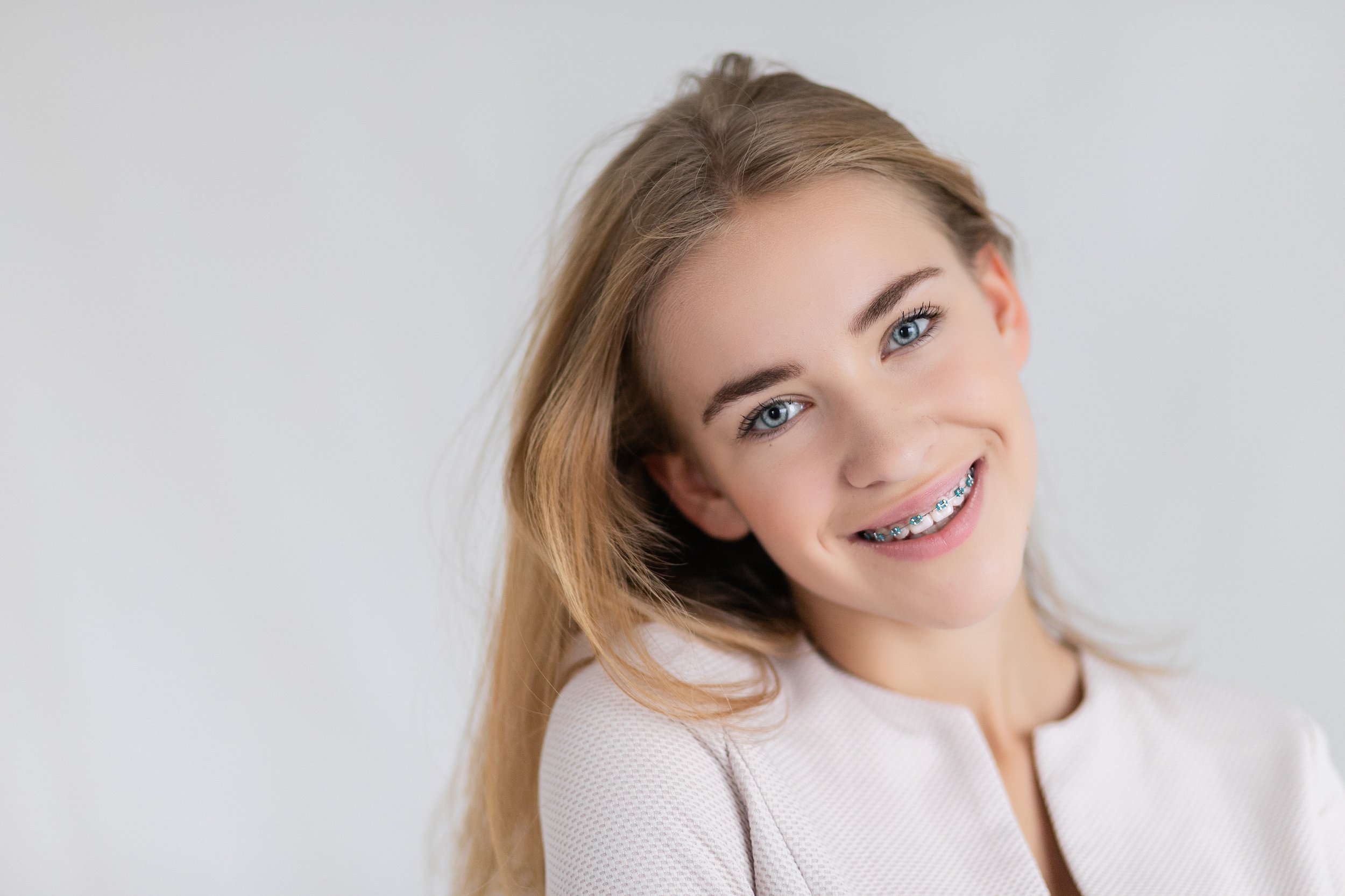 Patient with braces smiling